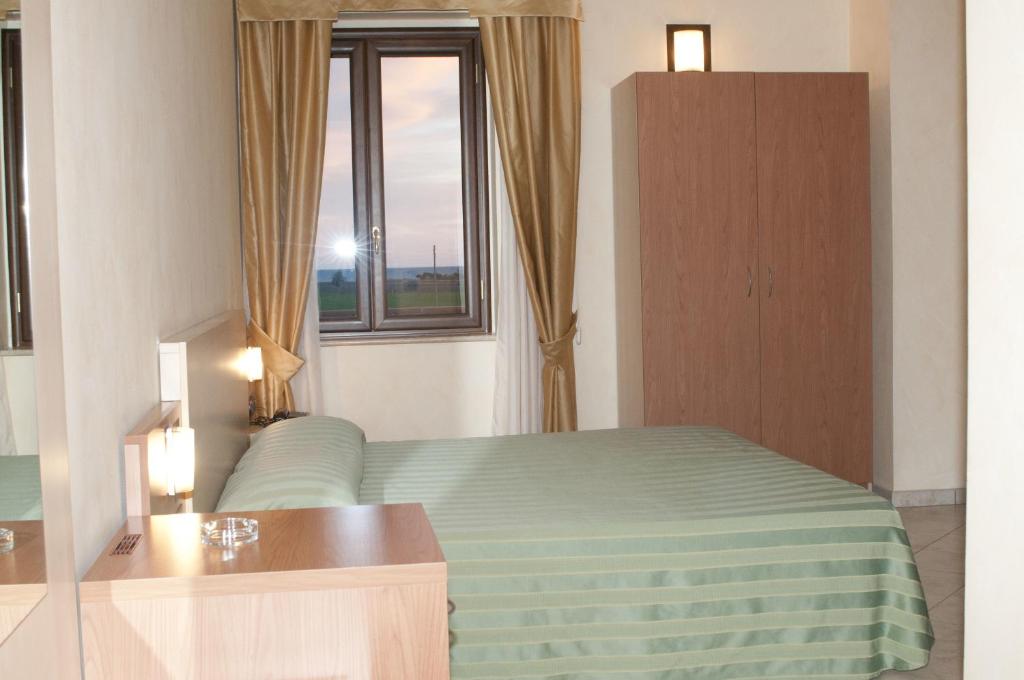 Postel nebo postele na pokoji v ubytování Hotel Onda Bleu