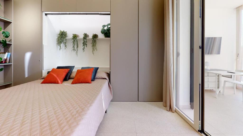 Postel nebo postele na pokoji v ubytování Carletta's Aparta-Suite & Spa