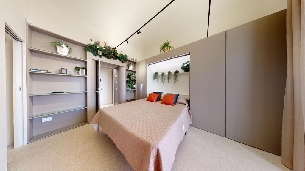 Postel nebo postele na pokoji v ubytování Carletta's Aparta-Suite & Spa