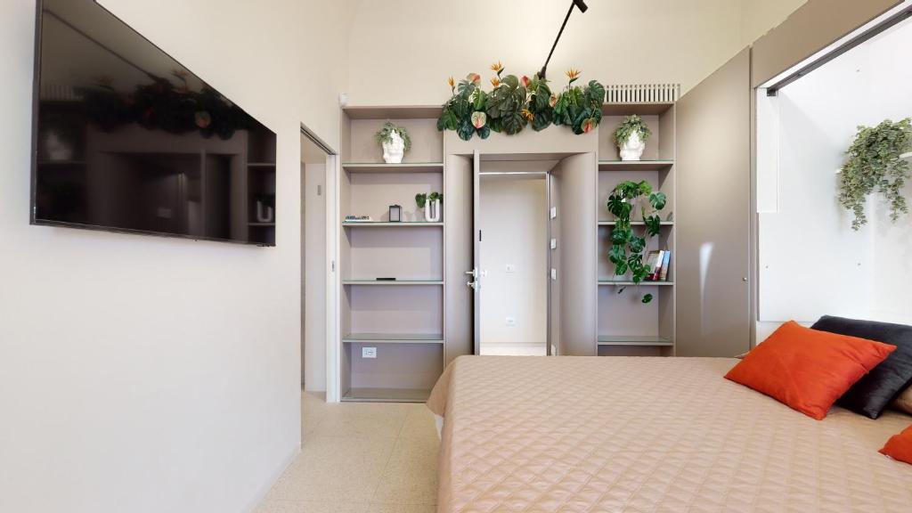 TV a/nebo společenská místnost v ubytování Carletta's Aparta-Suite & Spa