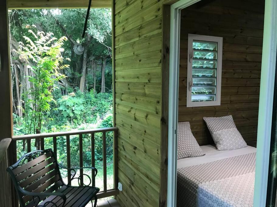 Balkón nebo terasa v ubytování Chalet Colibri , Les ANSES d'ARLET 200 m plage