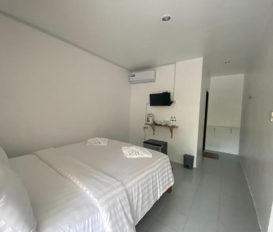 Кровать или кровати в номере White house bailan resort