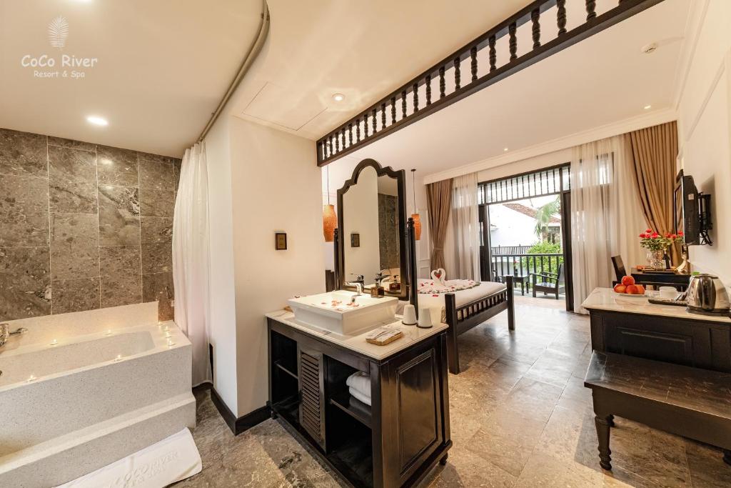 Koupelna v ubytování Hoi An Coco River Resort & Spa