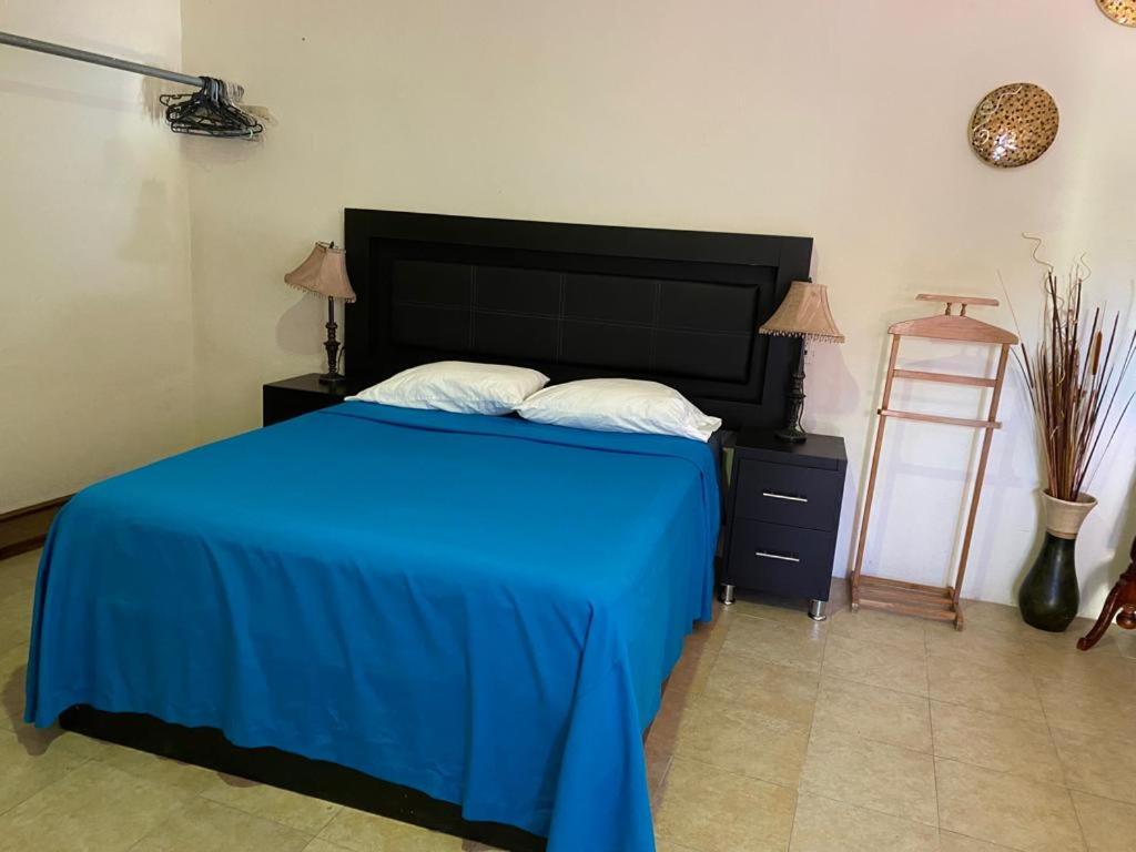 Postel nebo postele na pokoji v ubytování Estancia Santa Fe
