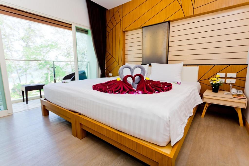 Postel nebo postele na pokoji v ubytování Anda Beachside Hotel
