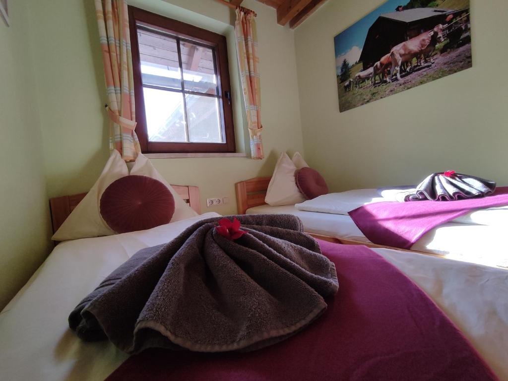 Postel nebo postele na pokoji v ubytování Landhaus Seebacher