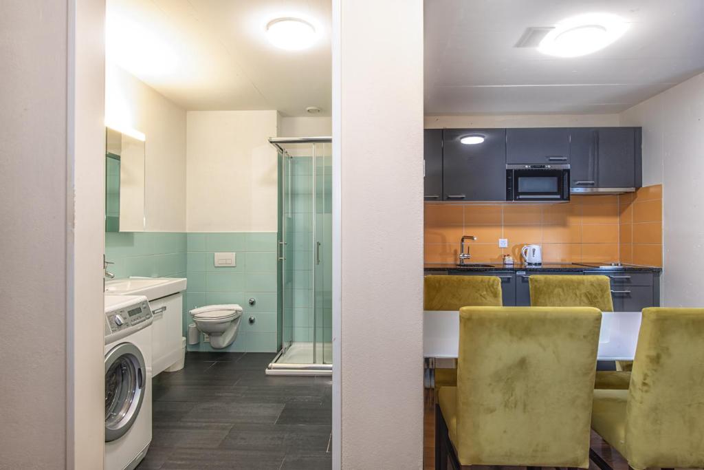Ένα μπάνιο στο Hotel Residence Loren - contact & contactless check-in