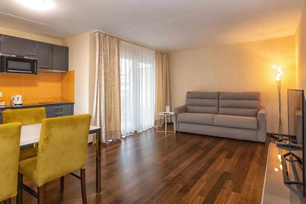 Χώρος καθιστικού στο Hotel Residence Loren - contact & contactless check-in
