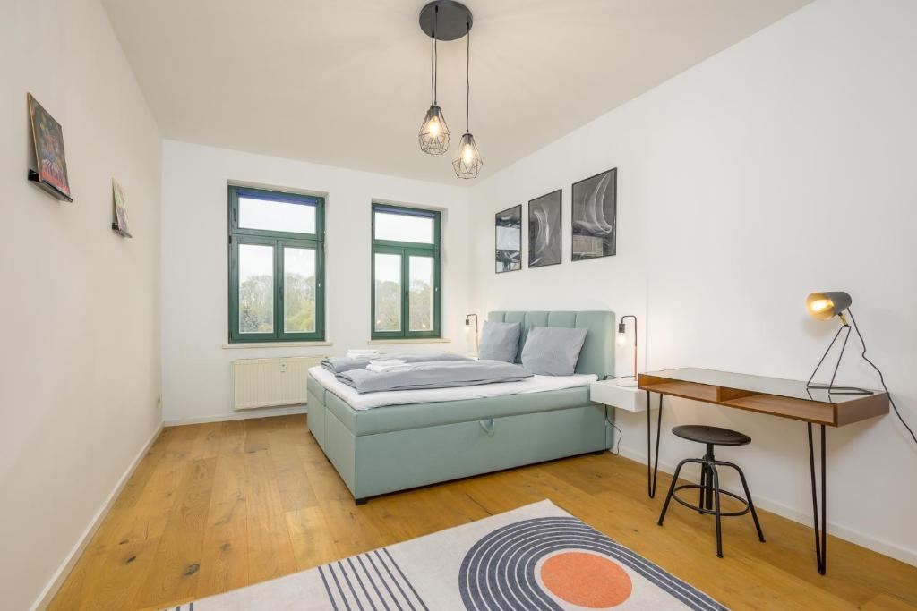 Postel nebo postele na pokoji v ubytování Arbio I Modern Apart near Leipzig Stötteritz
