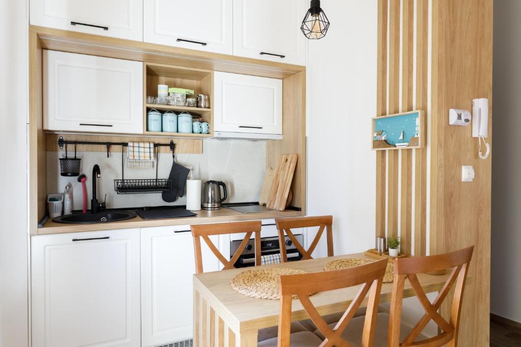 Η κουζίνα ή μικρή κουζίνα στο Apartman 34 Razloga