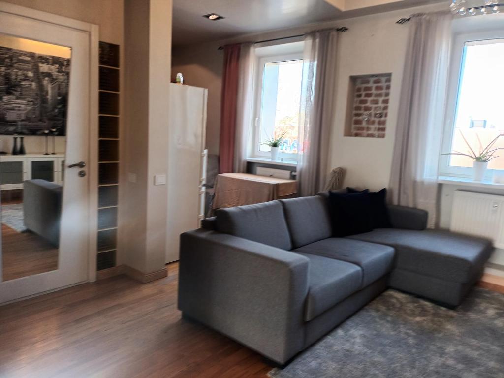 Posezení v ubytování Skaistakalnio apartamentai