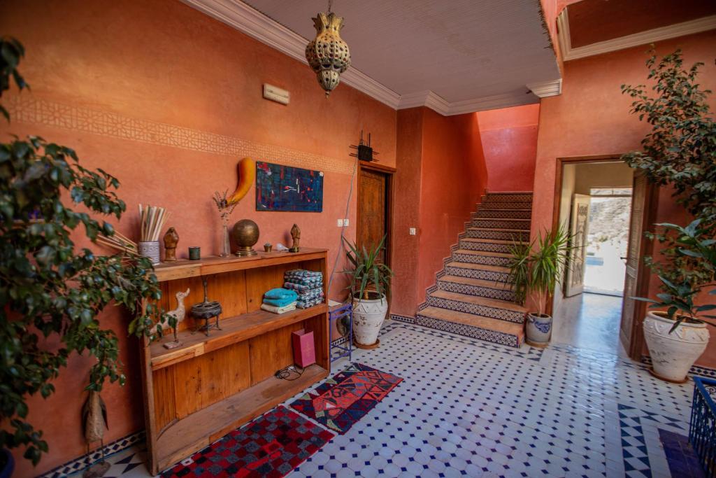 TV in/ali zabaviščno središče v nastanitvi Riad de l'Olivier - Paradise Valley
