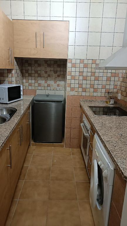 A kitchen or kitchenette at Casa AMALFi, Coqueta casa Centro histórico de Vejer