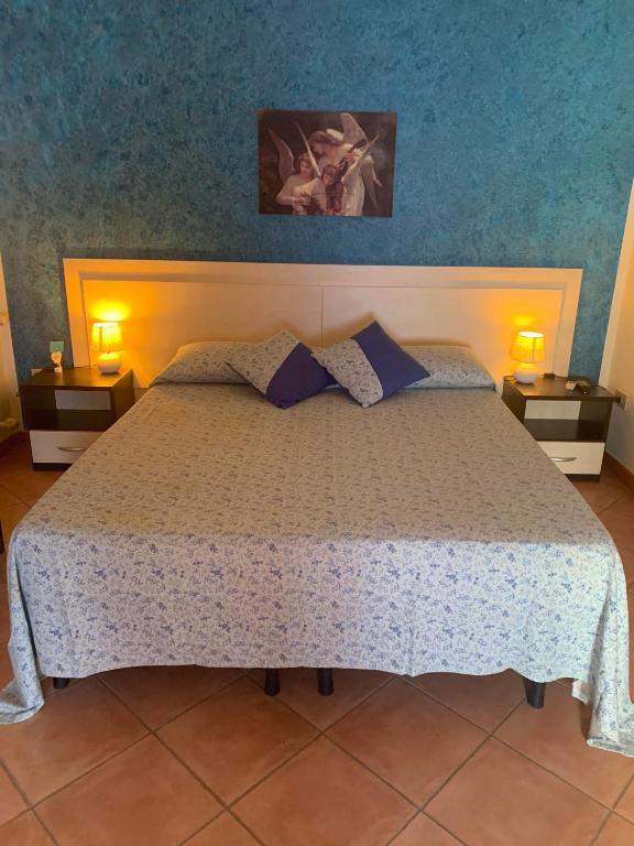 Postel nebo postele na pokoji v ubytování Albachiara holidays