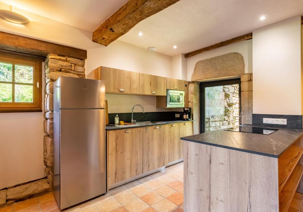 Kuchyňa alebo kuchynka v ubytovaní Gîte de l'Abbaye