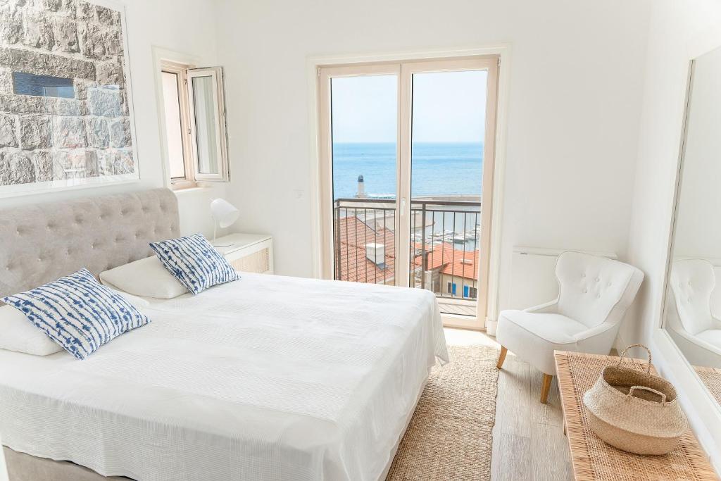Кровать или кровати в номере Lustica Bay