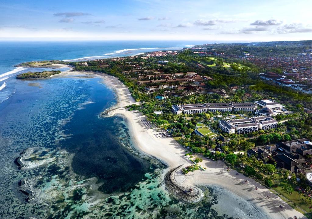 an aerial view of a beach and the ocean at Sofitel Bali Nusa Dua Beach Resort in Nusa Dua