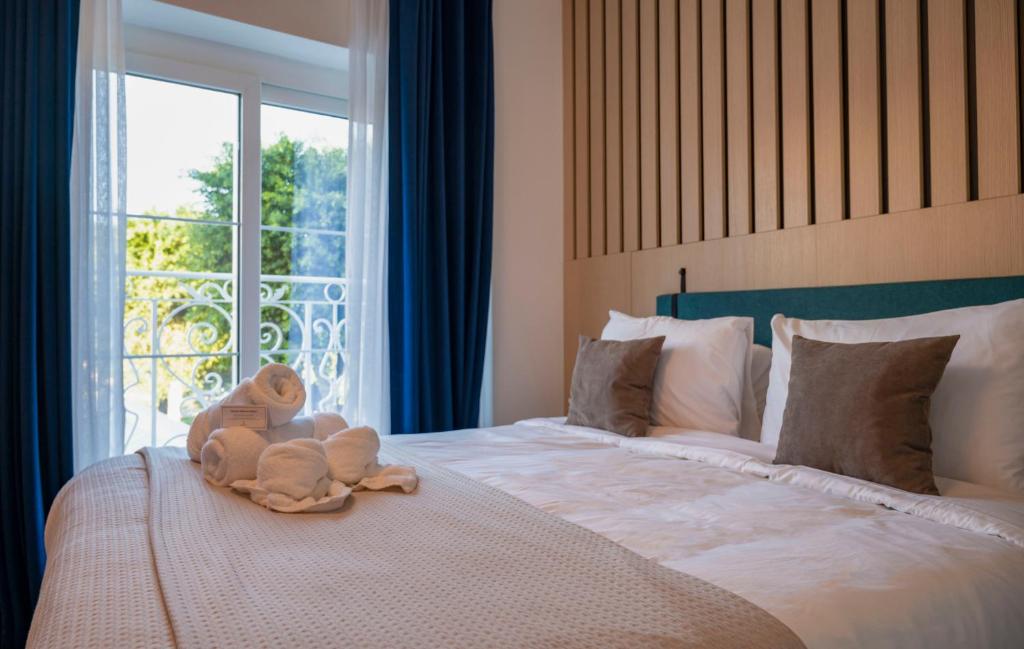 Кровать или кровати в номере Townhouse17 Boutique Bed & Breakfast