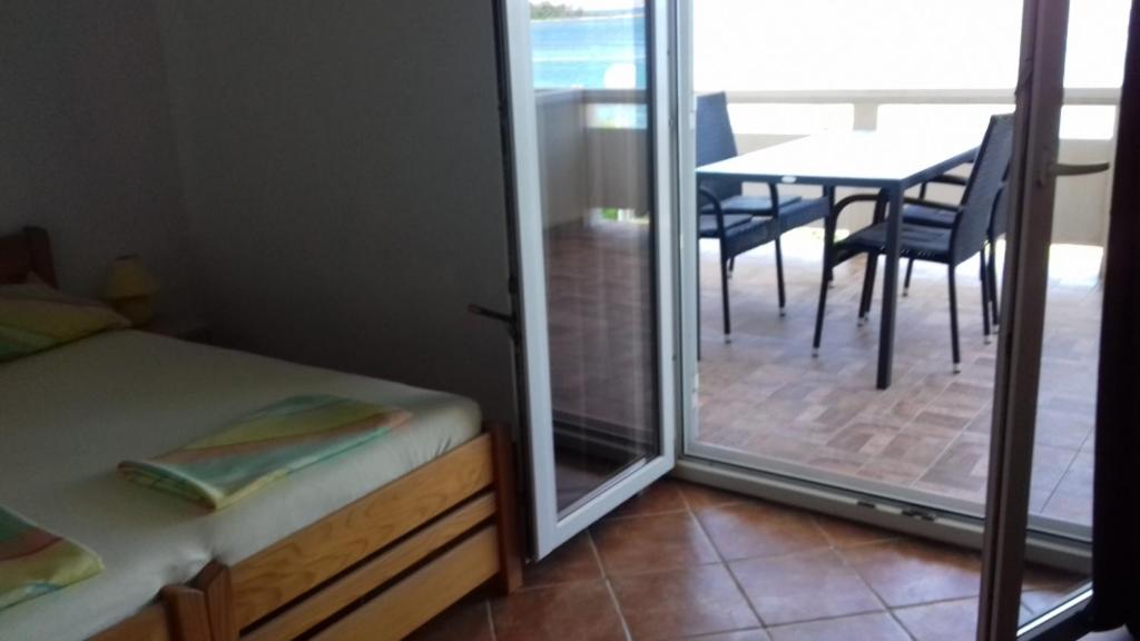 Posteľ alebo postele v izbe v ubytovaní Apartment in Vir with sea view, terrace, air conditioning, WiFi 4472-2