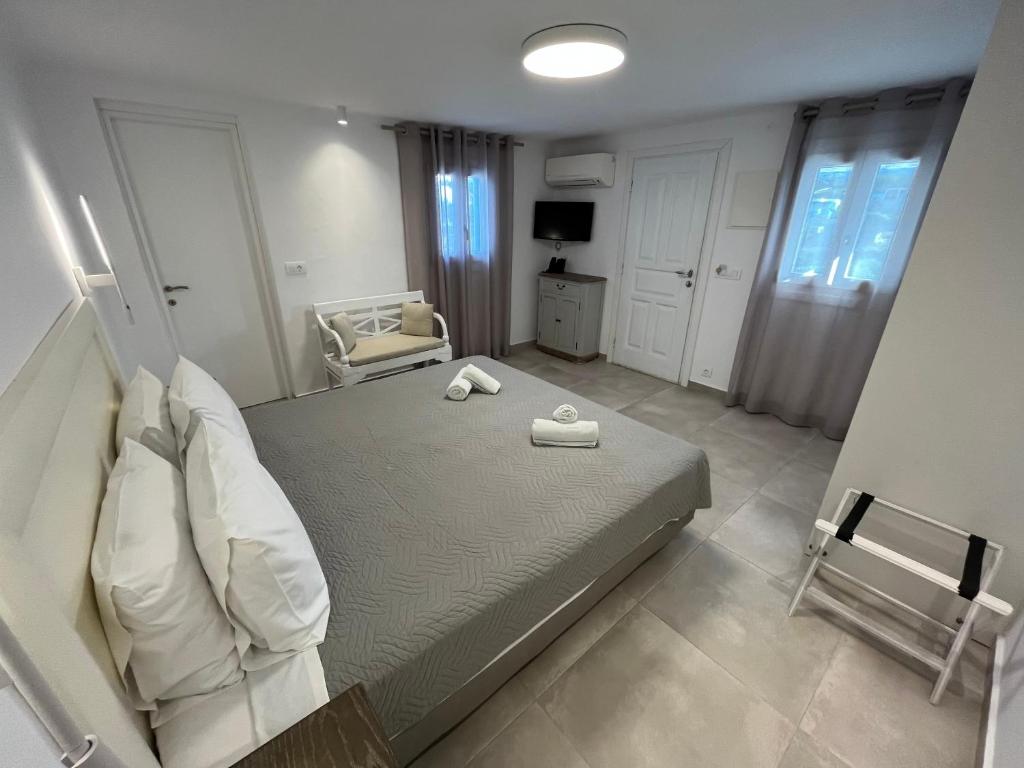 Postel nebo postele na pokoji v ubytování Villa Margarita