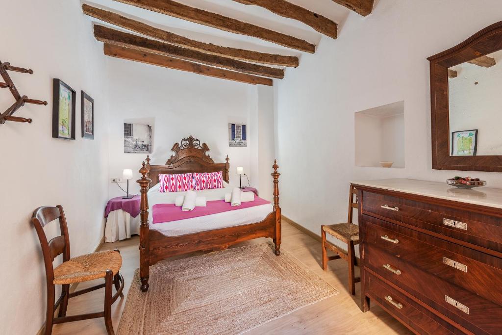 A bed or beds in a room at Jesus