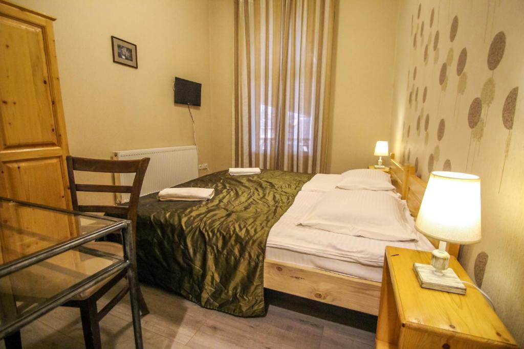 Postel nebo postele na pokoji v ubytování Hotel Svaneti