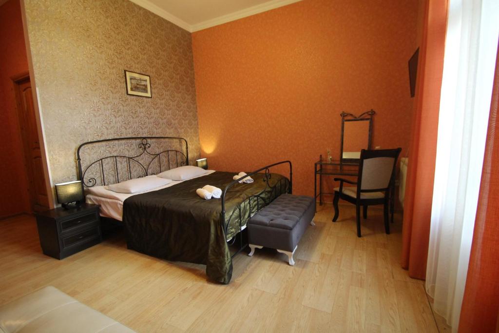 Postel nebo postele na pokoji v ubytování Hotel Svaneti