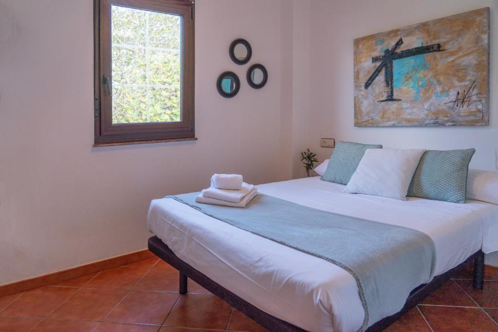 Postel nebo postele na pokoji v ubytování Casa en la playa de Area con finca privada