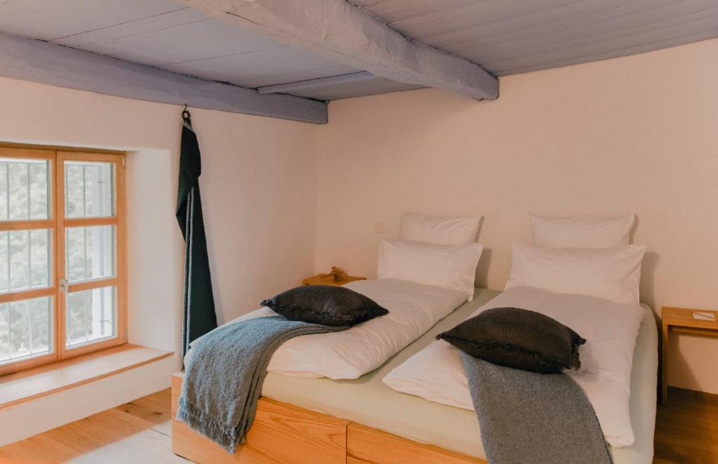 En eller flere senger på et rom på Corippo Albergo Diffuso