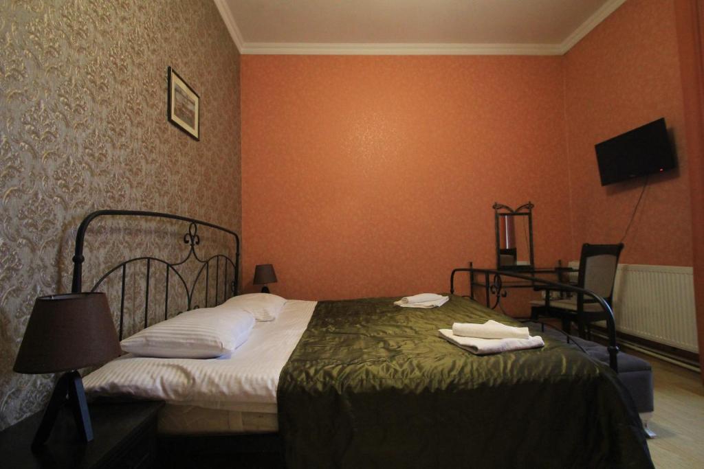 Postel nebo postele na pokoji v ubytování Hotel Svaneti