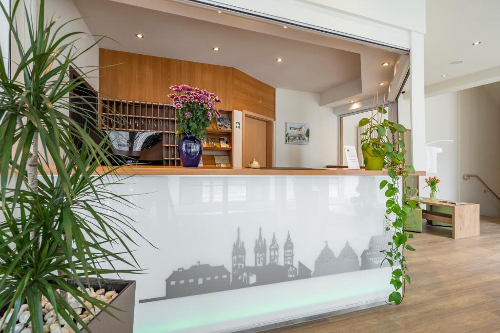 Kuchyň nebo kuchyňský kout v ubytování Center Hotel Kaiserhof