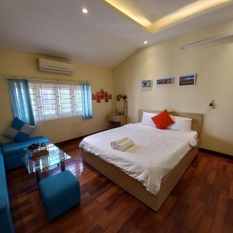 Postel nebo postele na pokoji v ubytování Hanowood Homestay