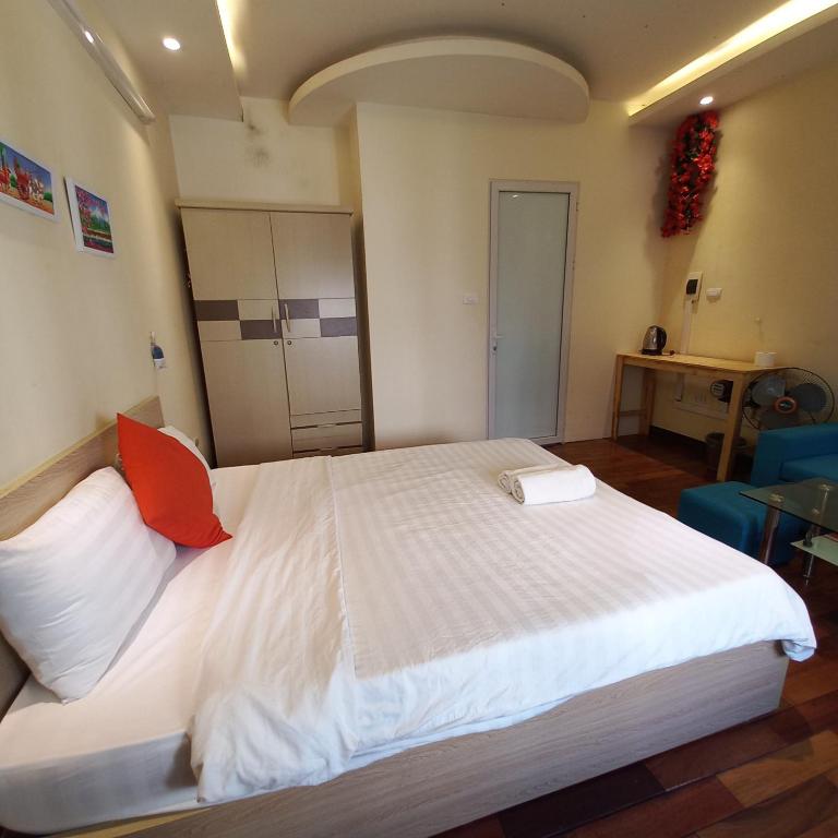 Postel nebo postele na pokoji v ubytování Hanowood Homestay