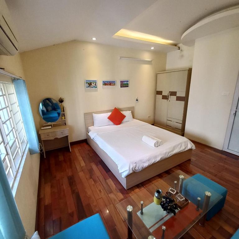 Postel nebo postele na pokoji v ubytování Hanowood Homestay