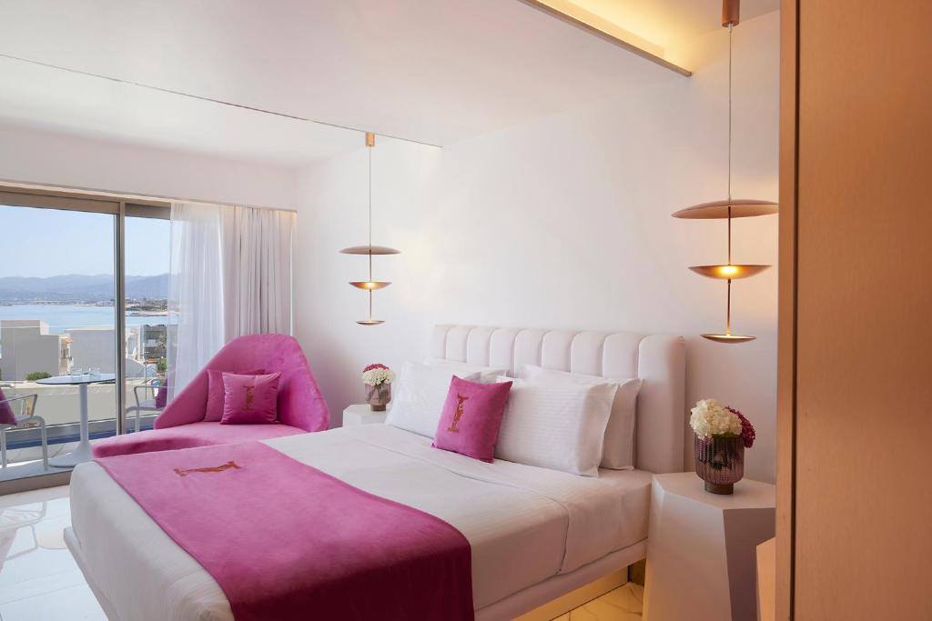 Ein Bett oder Betten in einem Zimmer der Unterkunft I Resort Beach Hotel & Spa