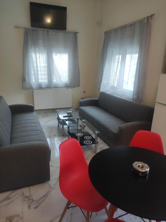 Posezení v ubytování GCM 2 ROOMS kentro