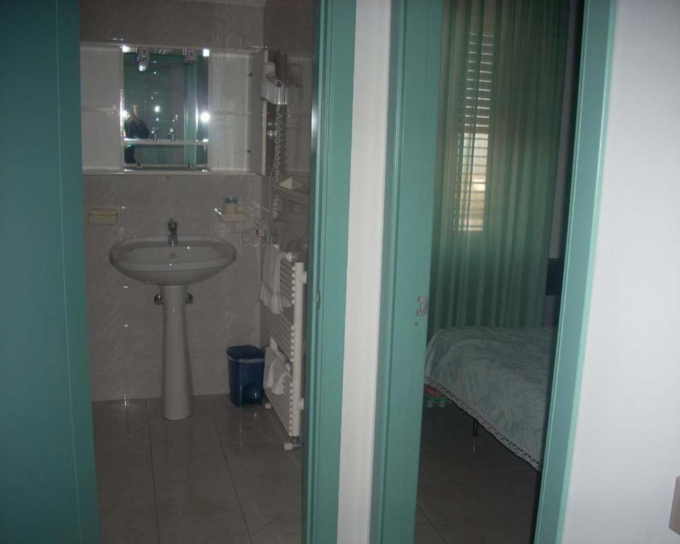Santoianni - Two Connecting Rooms