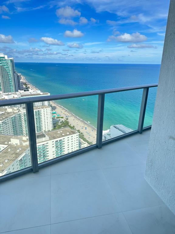 a view from the balcony of a condo overlooking the ocean at Hyde Resort Oceanview Luxurious 2-Bedroom PH 6Pax in Hollywood