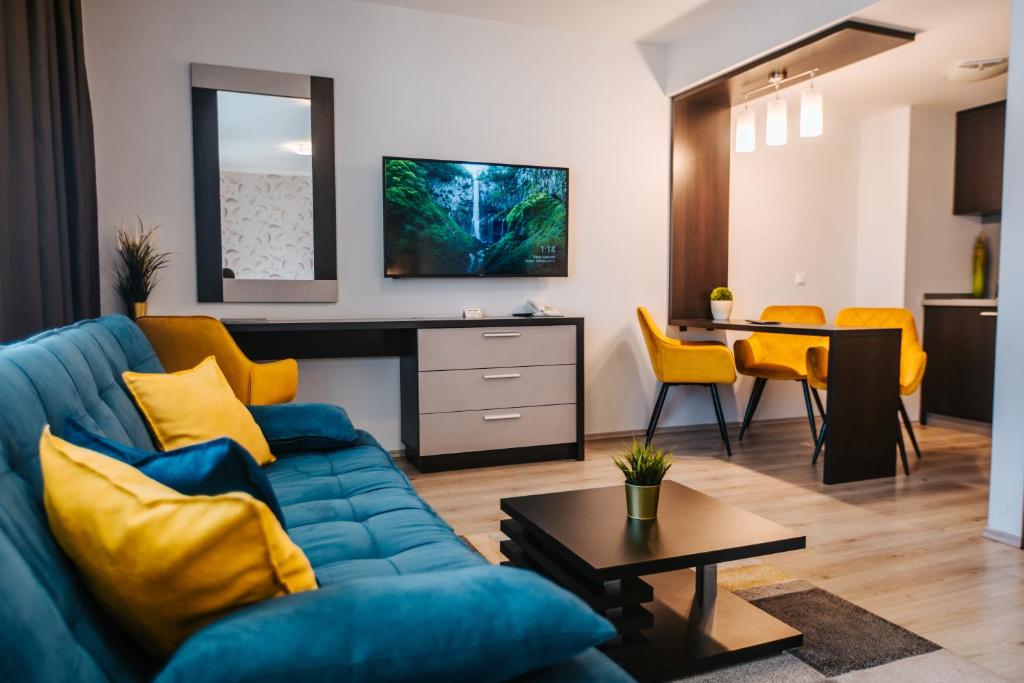 TV a/nebo společenská místnost v ubytování Hotel Auris
