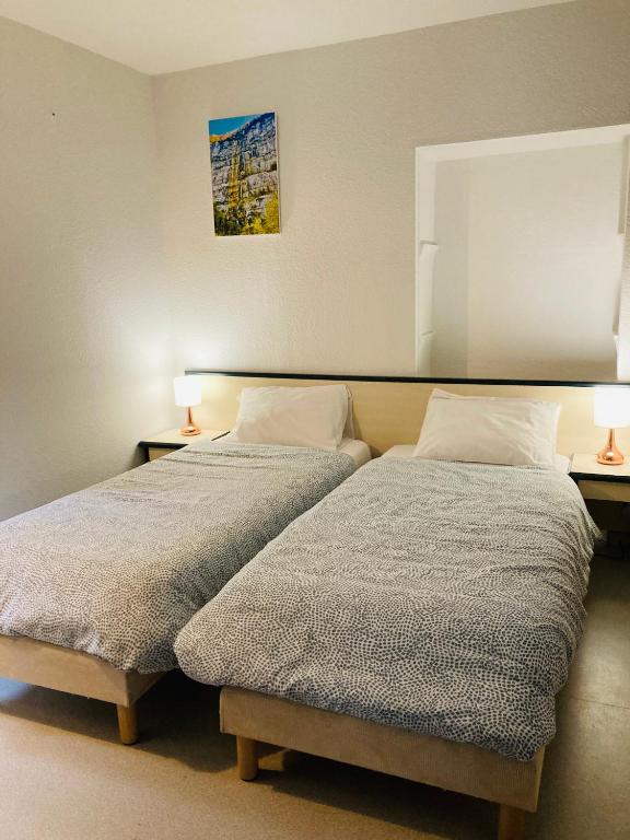 Postel nebo postele na pokoji v ubytování Le Jorjane