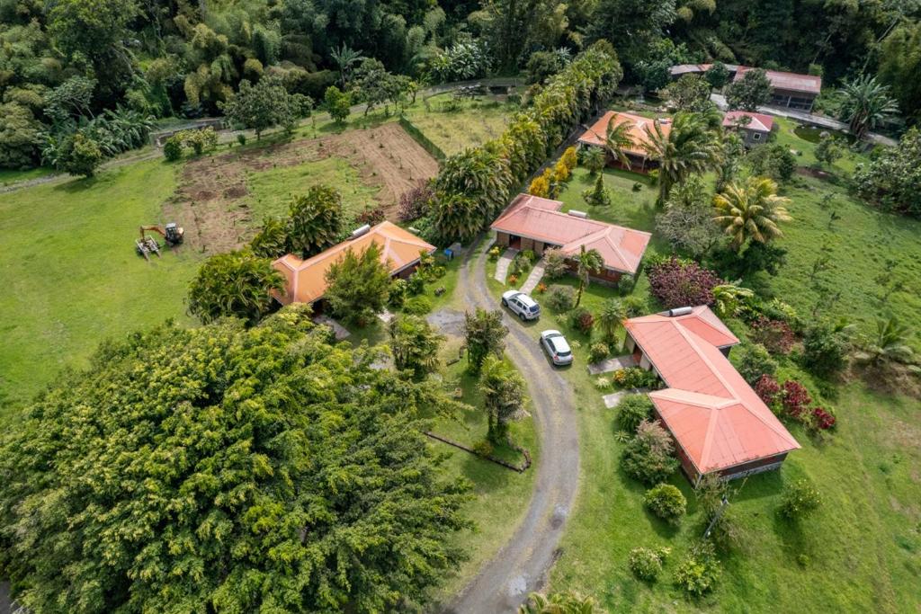an aerial view of a house with a road at LE DOMAINE DE LA VALLEE in Le Morne Rouge