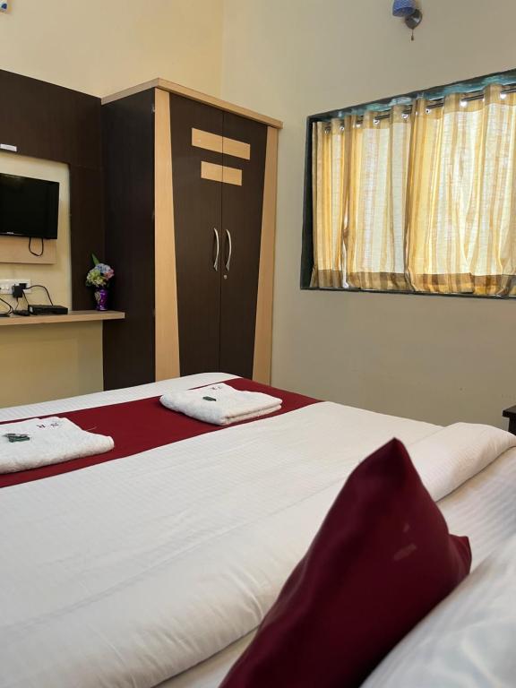 Postel nebo postele na pokoji v ubytování S2 Residency