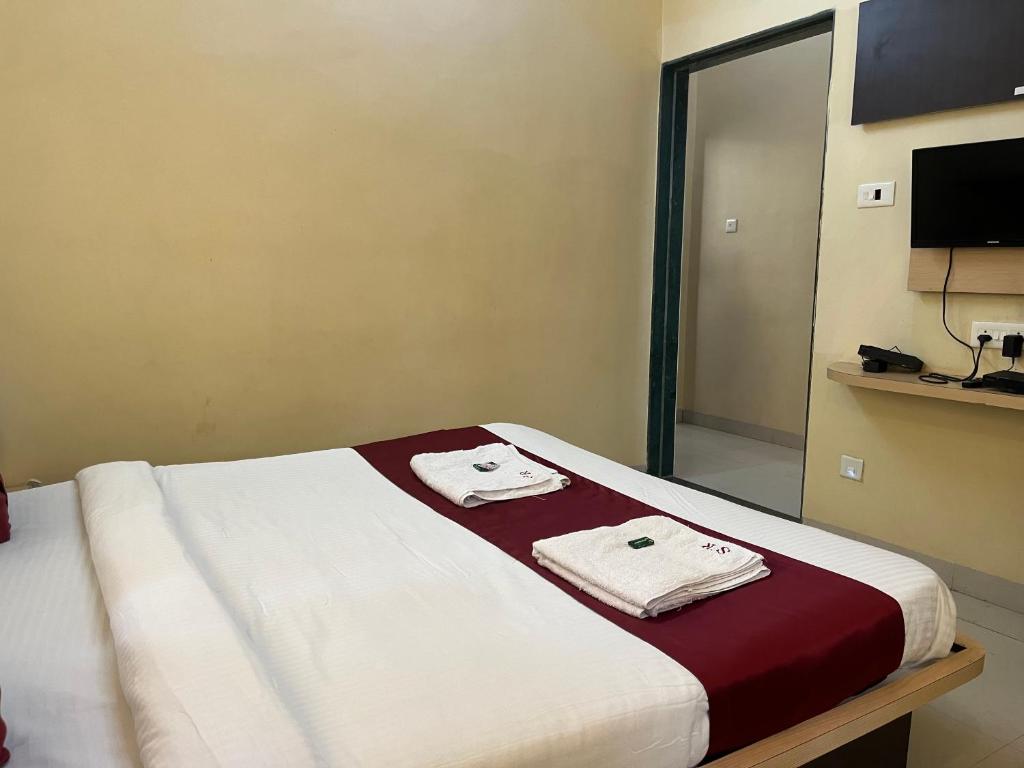 Postel nebo postele na pokoji v ubytování S2 Residency