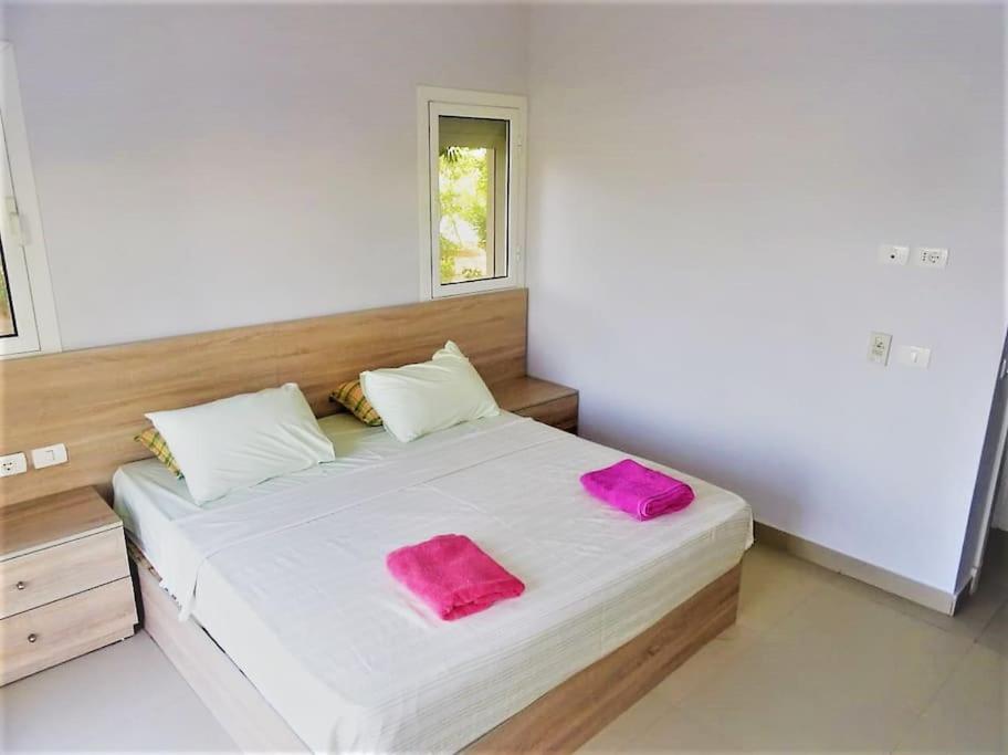 Postel nebo postele na pokoji v ubytování Water Side - Luxurious Ground floor 3 BD Apartment in El Gouna-Red Sea