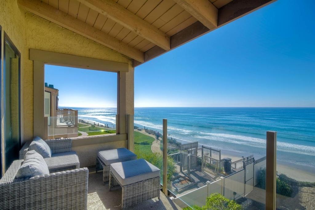 a balcony with a view of the ocean at Oceanfront Views, Heated Pool, Hot Tubs, Parking in Solana Beach
