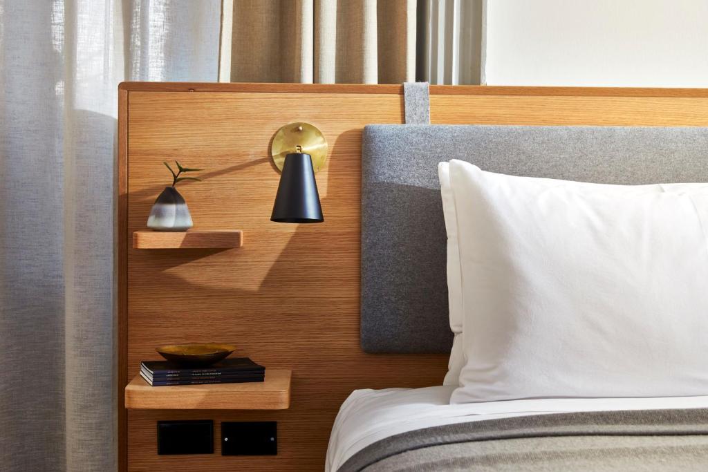 Postel nebo postele na pokoji v ubytování Hotel Kinsley
