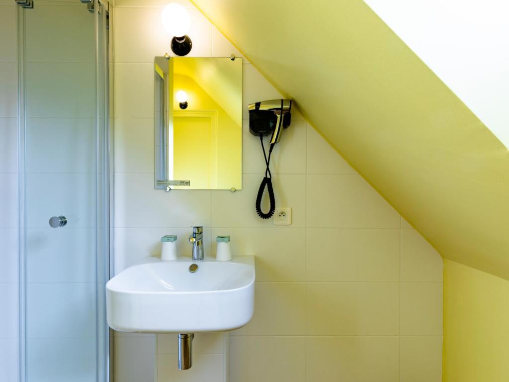 Koupelna v ubytování MOKA Hôtel