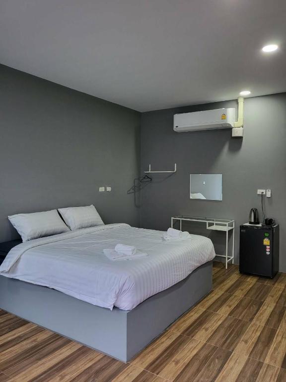 Postel nebo postele na pokoji v ubytování No 9 HOUSE Hua Hin