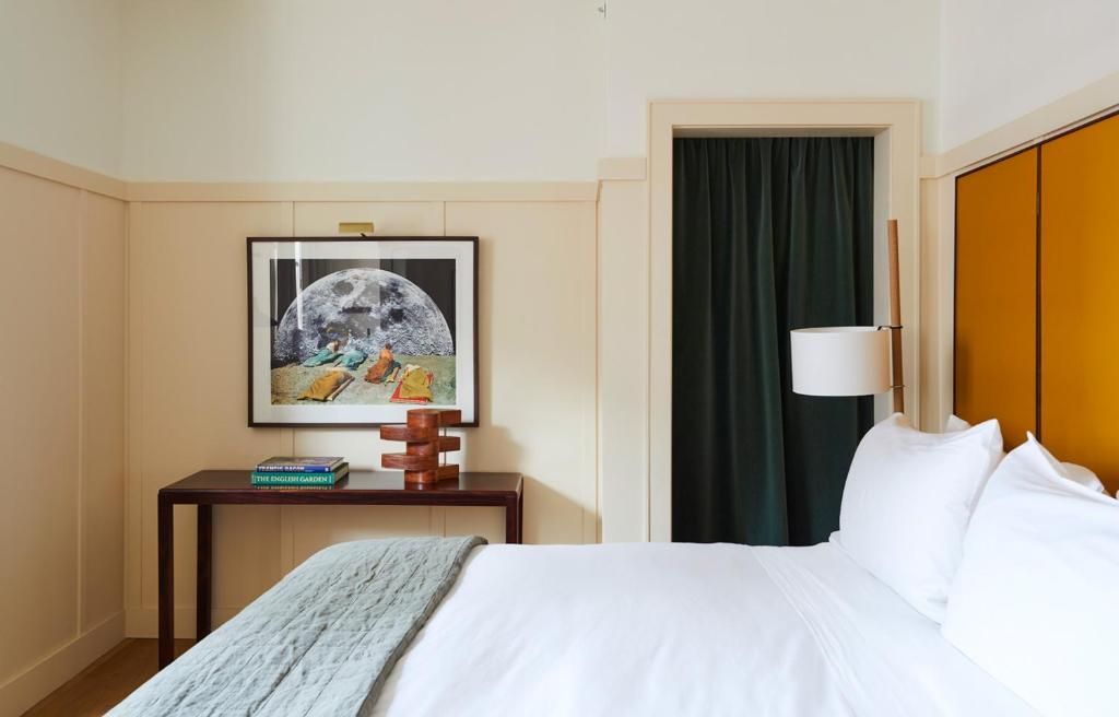 Postel nebo postele na pokoji v ubytování Hotel Kinsley