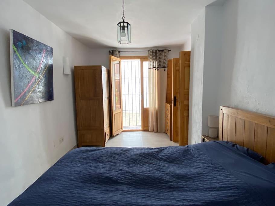 Postel nebo postele na pokoji v ubytování Casa Palma
